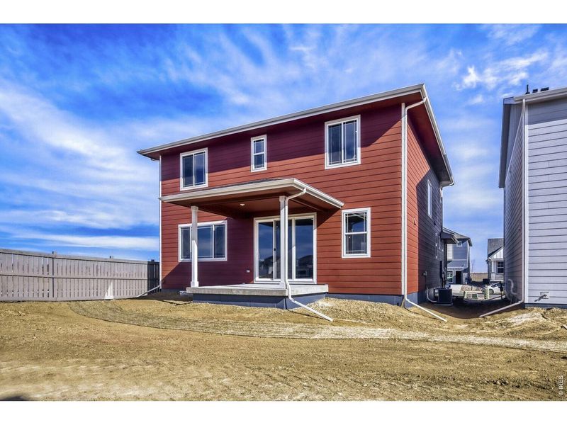 Exterior details and patio area of a home in Farmstead, Berthoud (Image 3).