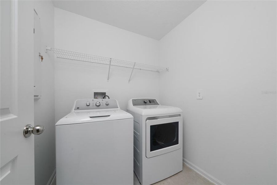 Furnished interior view inside a new home in Ranches at Lake Mcleod: Legacy Collection, Eagle Lake (Image 7).