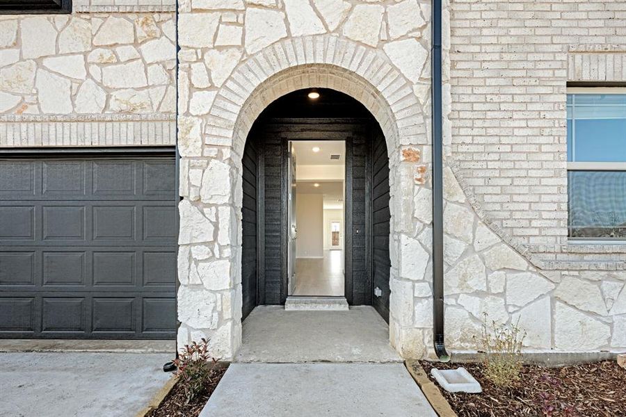 Exterior details and patio area of a home in East Oak Creek Elements, Commerce (Image 3).