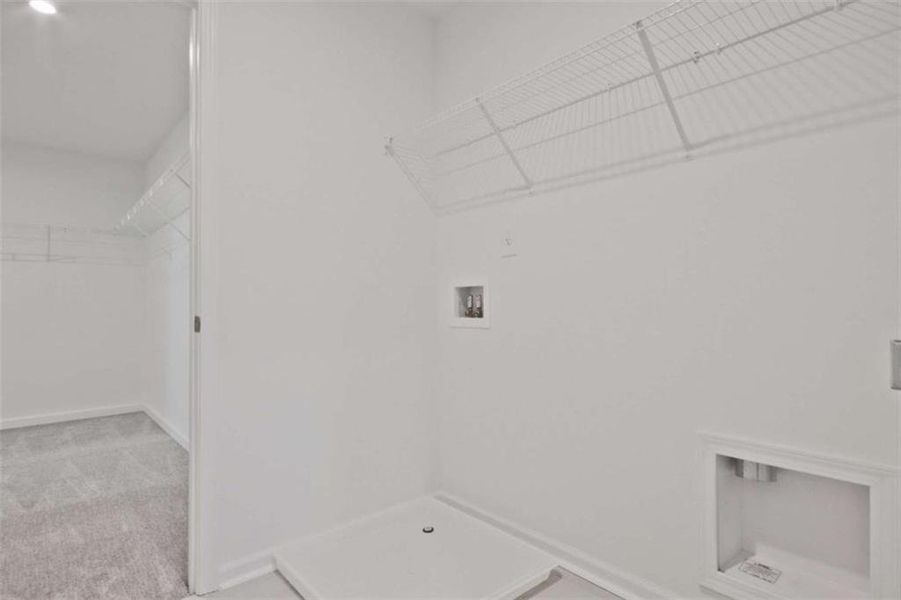 Spacious, unfurnished interior of a new home in The Paddocks at Doc Hughes, Buford (Image 27).