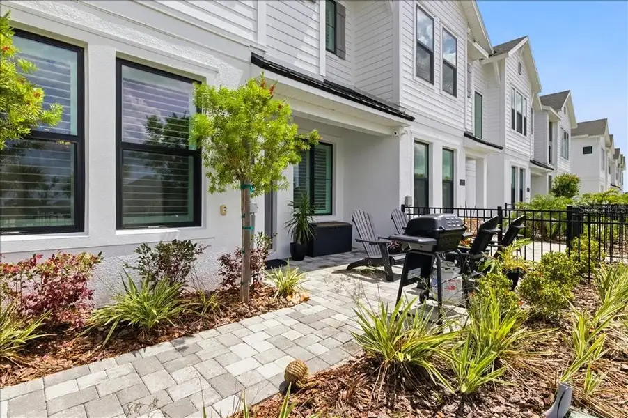 Exterior details and patio area of a home in , Sarasota (Image 25).
