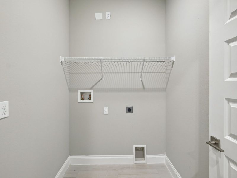 Laundry Room in the Bergamo floorplan at 8984 Dahlia Circle