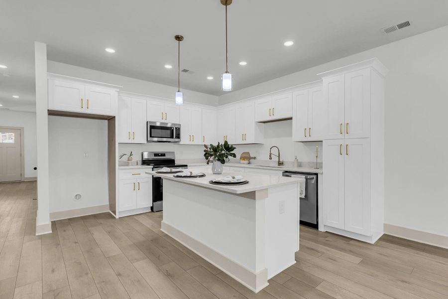 Furnished interior view inside a new home in , North Charleston (Image 7).