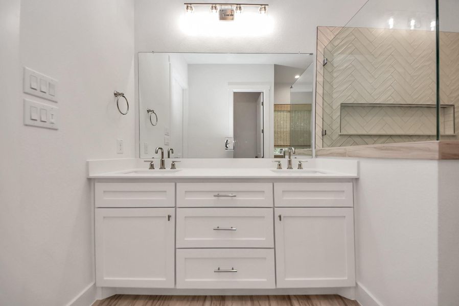 Another view of double sinks in primary bath with ample counter space.