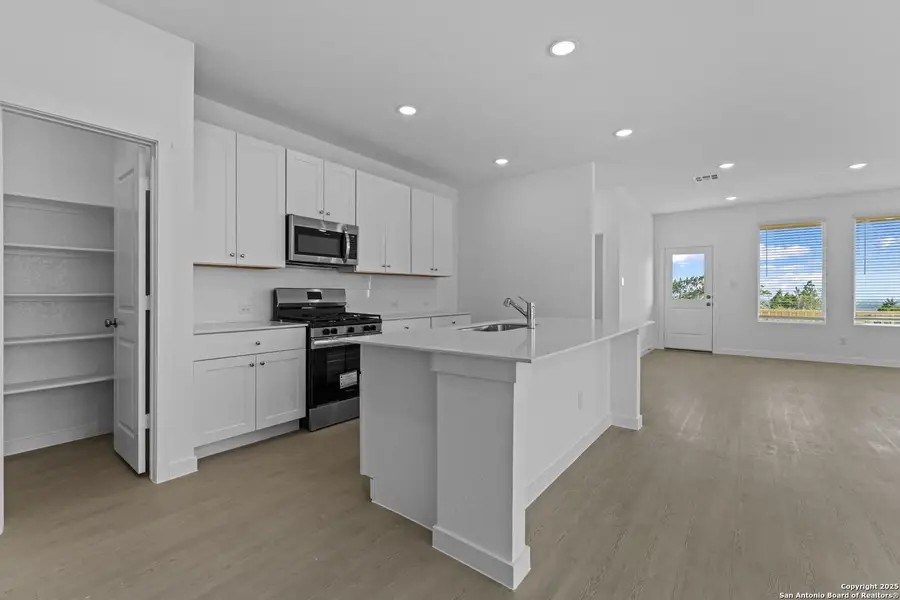Furnished interior view inside a new home in Waterwheel: Coastline Collection, San Antonio (Image 7).