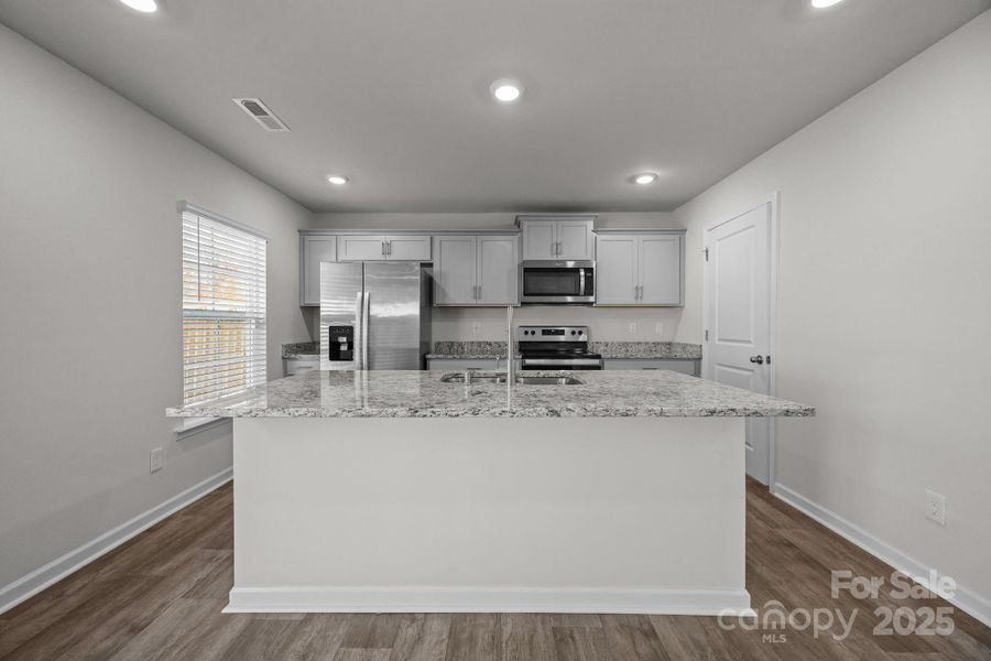 Furnished interior view inside a new home in , Mocksville (Image 13).