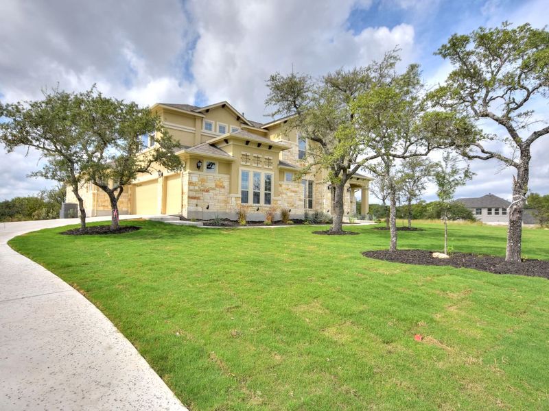 Representative exterior photo of a completed home built from the Madera II by Giddens Homes in Scofield Farms Estates, Georgetown, TX (Image 50).