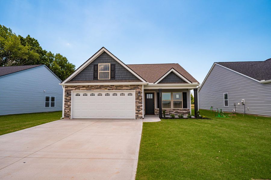 Representative exterior photo of a completed home built from the Wellford by Enchanted Homes in Arcadia Village, Spartanburg, SC (Image 21). Representative exterior photo of a completed home built from the Wellford by Enchanted Homes in Arcadia Village, Spartanburg, SC (Image 21).