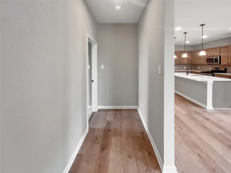The Oakshire II- Hall Bath to Secondary Bedroom. Home under construction.  Sample image for illustration; upgrades, options, and colors may vary.
