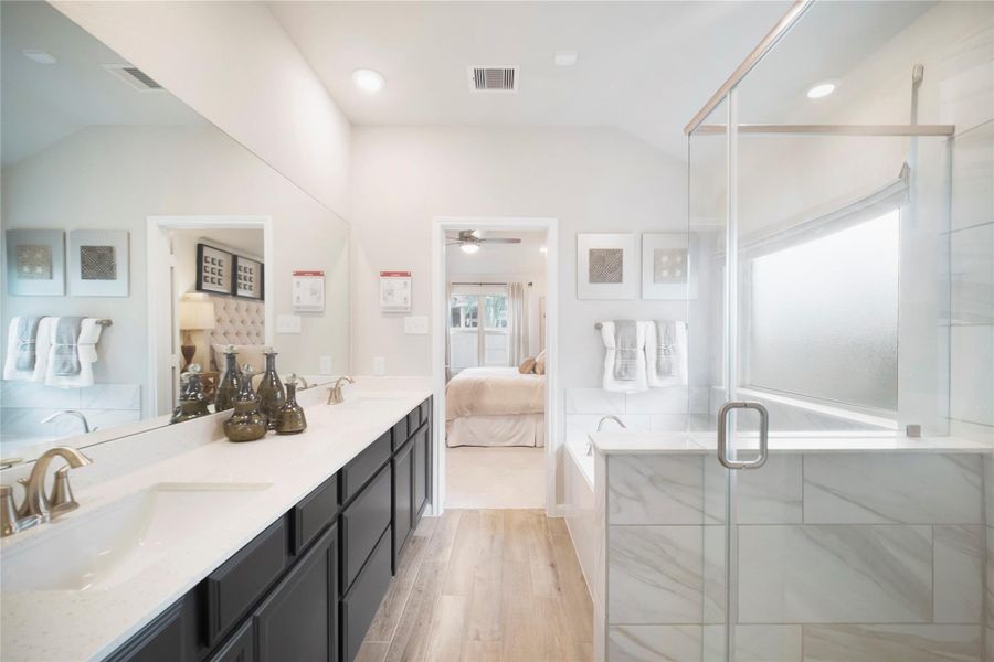 Furnished interior view inside a new home in Sunterra: Premier Collection, Katy (Image 20). Furnished interior view inside a new home in Sunterra: Premier Collection, Katy (Image 20).