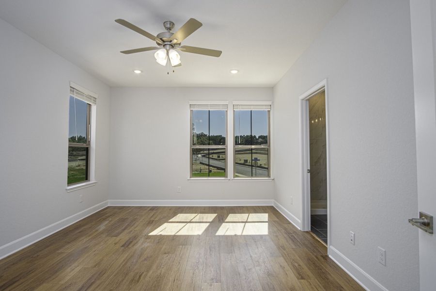 Representative unfurnished interior of a home built from the The Palmer by Rosehaven Homes in Magnolia Village, San Antonio (Image 13).