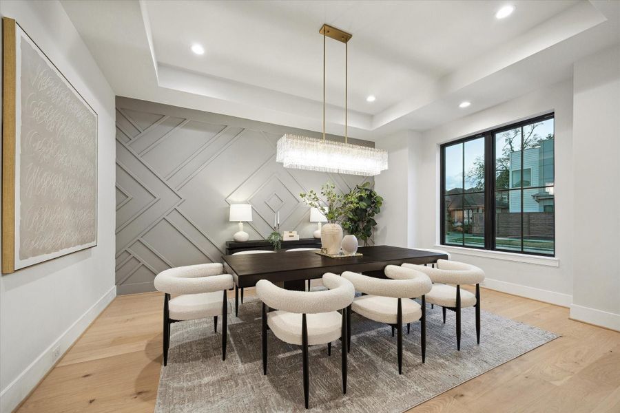 Formal dining room with accent wall.