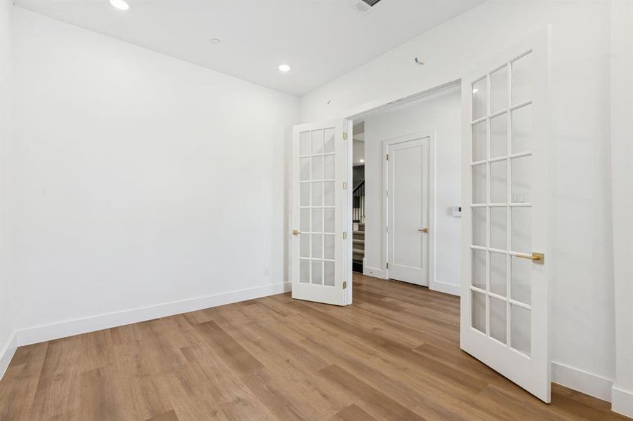 Flex space with french doors.