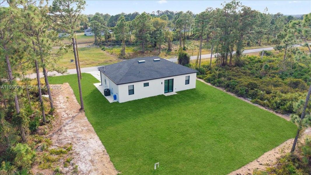Exterior details and patio area of a home in , Lehigh Acres (Image 29). Exterior details and patio area of a home in , Lehigh Acres (Image 29).