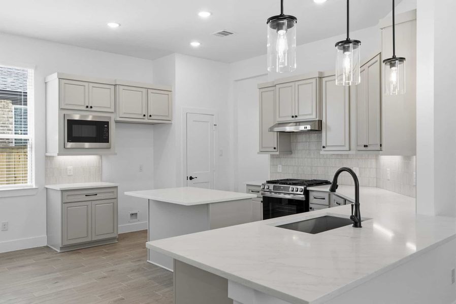 Furnished interior view inside a new home in Bridgeland, Cypress (Image 11). Furnished interior view inside a new home in Bridgeland, Cypress (Image 11).