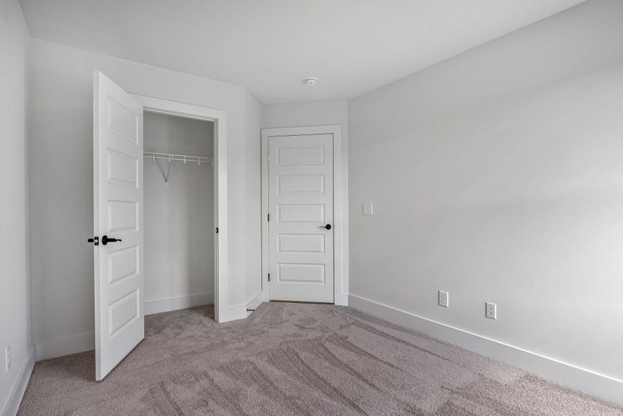Representative unfurnished interior of a home built from the Ingram Rowhome by Parkside Builders in Anderson Park, Hendersonville (Image 27).