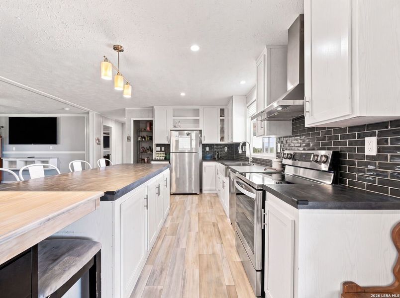 Furnished interior view inside a new home in , Devine (Image 10).