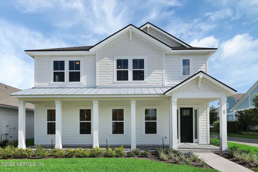 Front exterior of a new home in Seabrook Village at Seabrook, Nocatee, FL, highlighting curb appeal (Image 32). Front exterior of a new home in Seabrook Village at Seabrook, Nocatee, FL, highlighting curb appeal (Image 32).