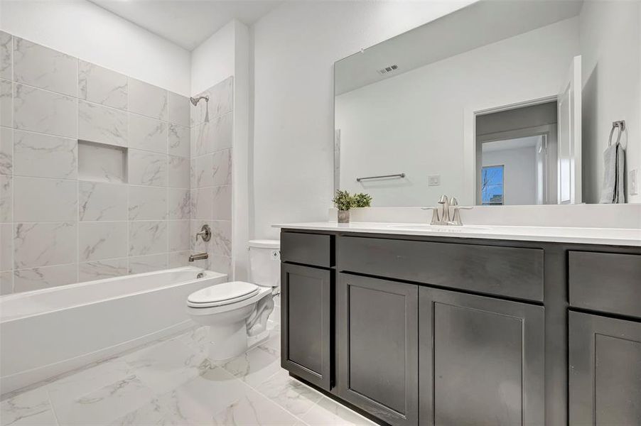 Furnished interior view inside a new home in Lily Creek at Sutton Fields, Aubrey (Image 9).