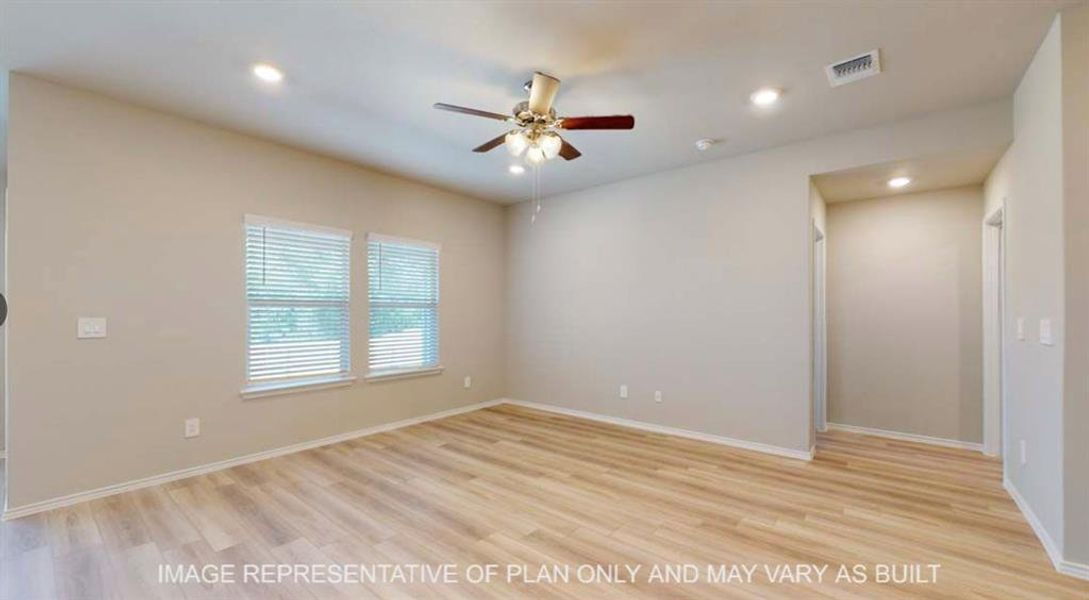 Spare room featuring ceiling fan, light wood finished floors, and recessed lighting