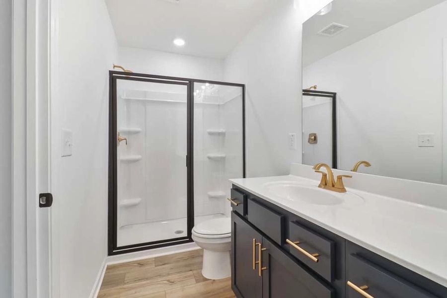 Sample Photo: Primary Bathroom featuring Luxe Collection Finishes