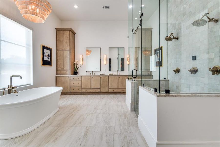 Bathroom with tile floors, vanity, and plus walk in shower