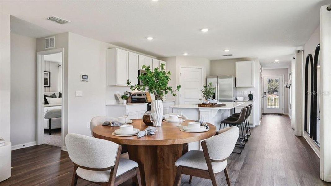 Furnished interior view inside a new home in Lake Deer Estates, Poinciana (Image 9).