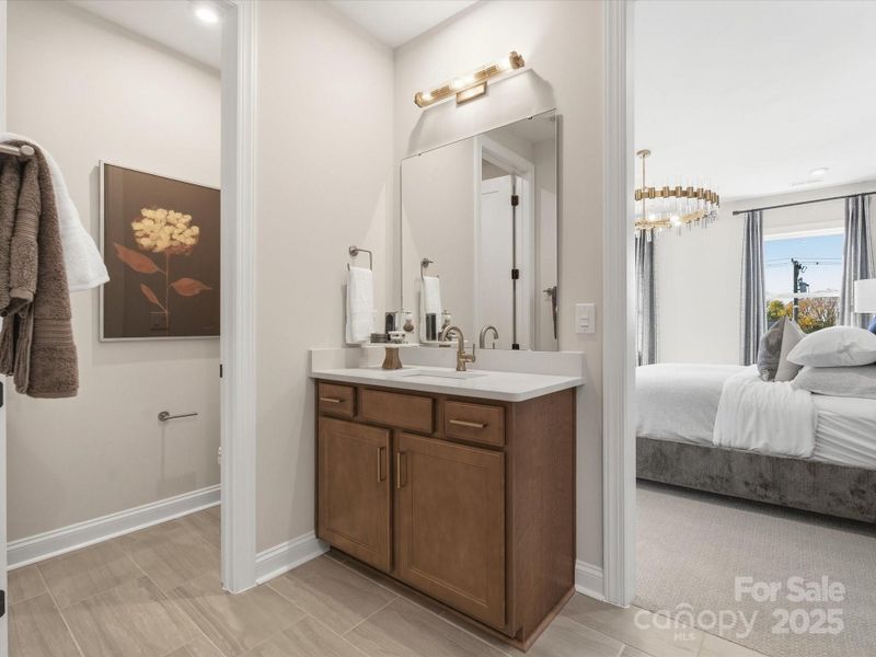 Split Dual Vanity at Primary Bath. *Model Photos | Actual Finishes, Structural Selections, and Orientation May Vary.