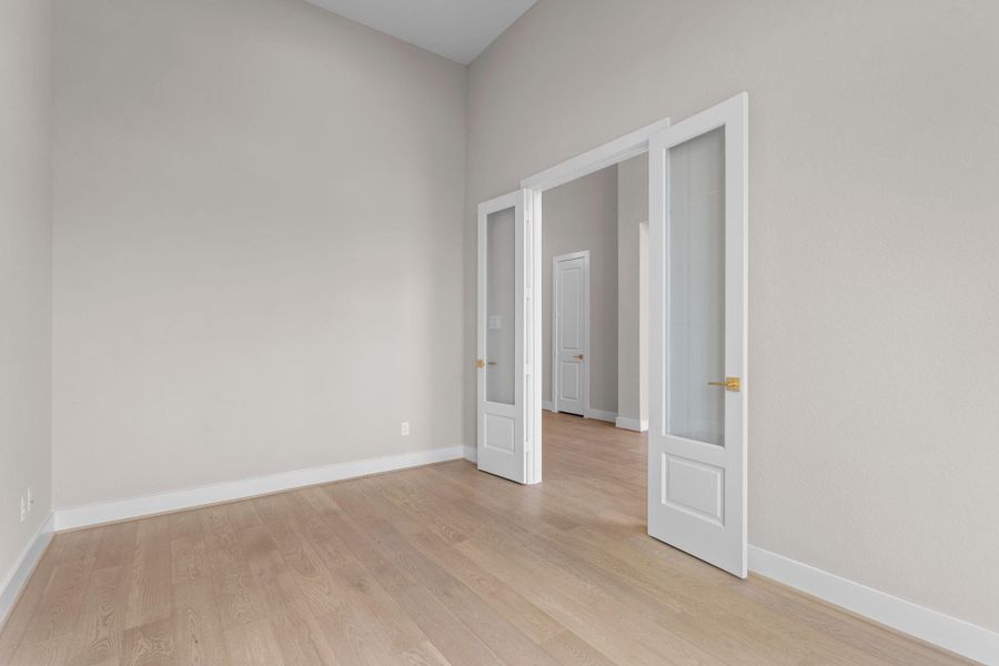 The study and dining room flank the elegant front foyer
