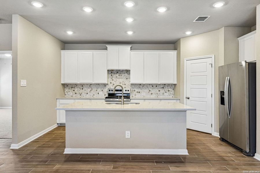 Furnished interior view inside a new home in Royal Crest, San Antonio (Image 7).