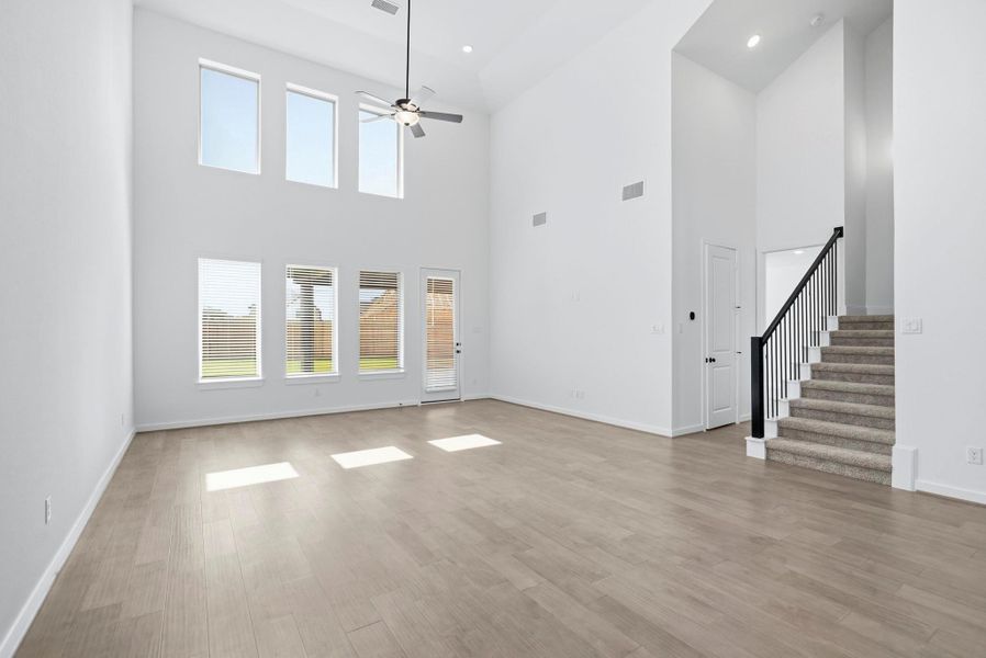 Light-Filled Gathering Space Anchoring The Heart Of The Home Light-Filled Gathering Space Anchoring The Heart Of The Home