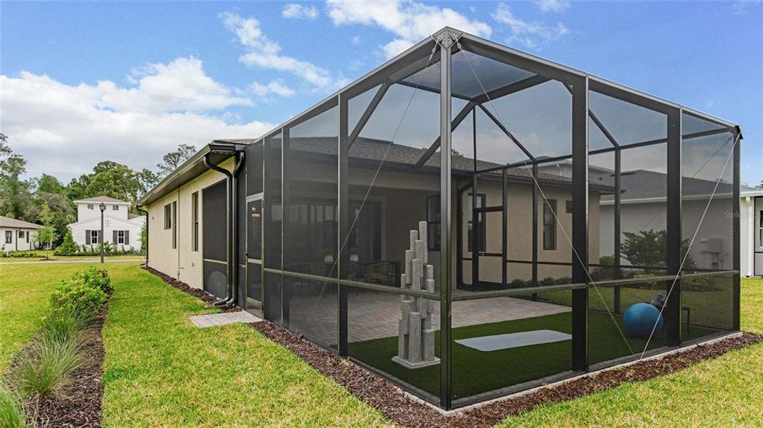 Exterior details and patio area of a home in Cresswind DeLand, Deland (Image 3).