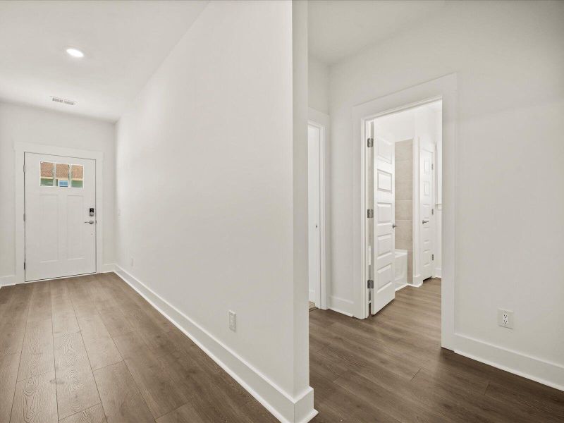 Spacious, unfurnished interior of a new home in The Coves at Lakes of Cane Bay, Summerville (Image 12). Spacious, unfurnished interior of a new home in The Coves at Lakes of Cane Bay, Summerville (Image 12).