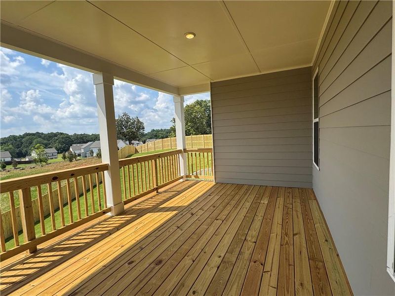 Exterior details and patio area of a home in Rosewood Lake Preserve, Hoschton (Image 23).