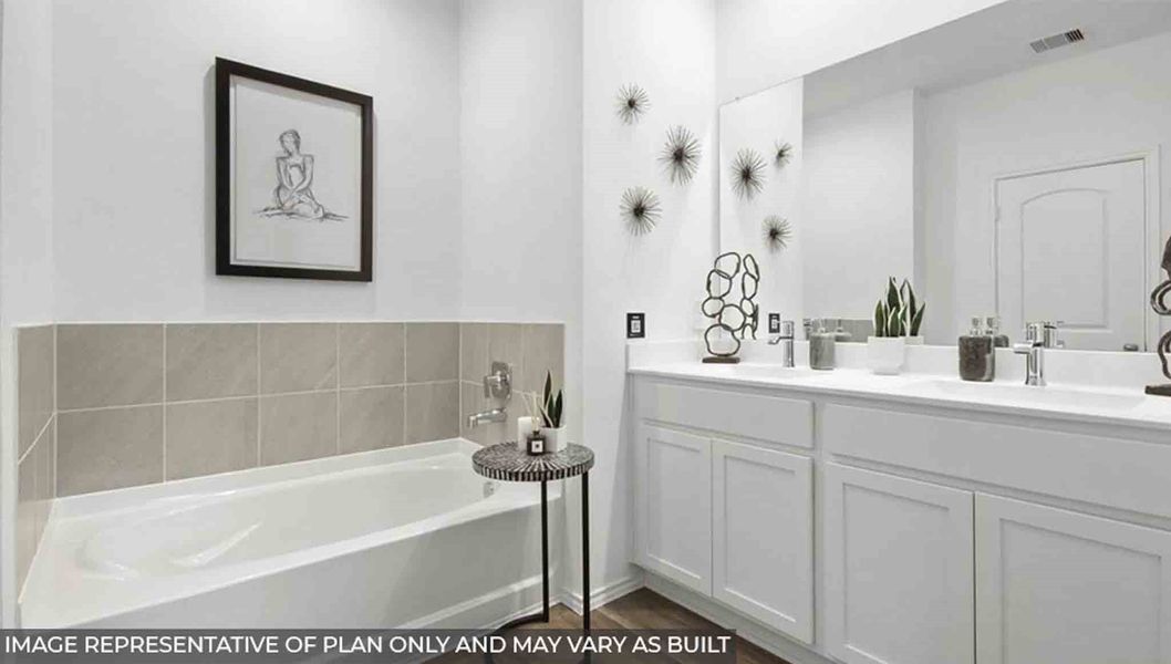 Furnished interior view inside a new home in Sunterra, Katy (Image 11).