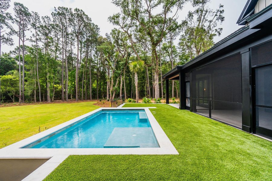 Exterior details and patio area of a home in , Johns Island (Image 39).