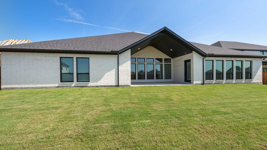 Representative exterior details of a home built from the 4411W by Perry Homes in Enchanted Creek, Allen (Image 4).