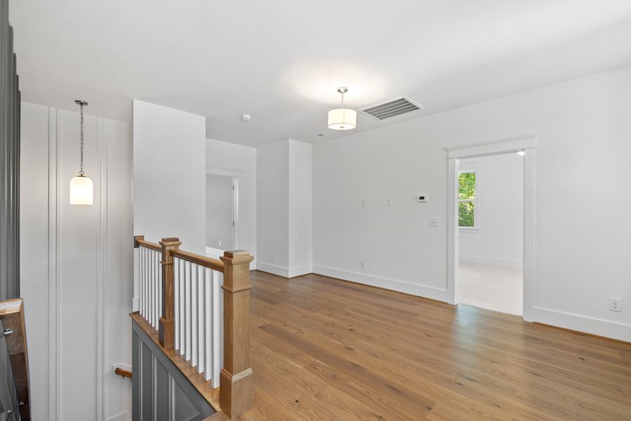 Representative unfurnished interior of a home built from the The Emerson by RobuckHomes in Stonehenge, Raleigh (Image 187).