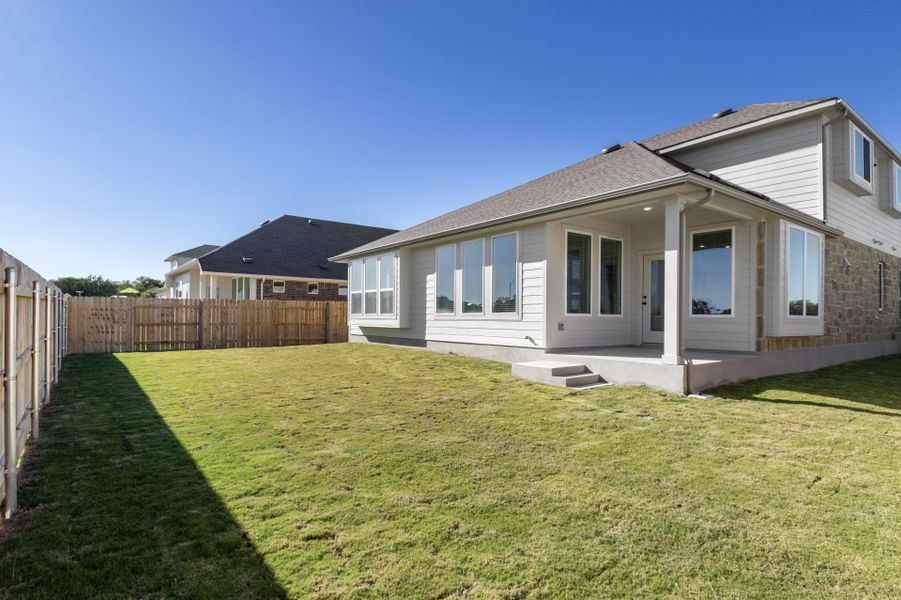 Exterior details and patio area of a home in Grande Estates, Bertram (Image 30).