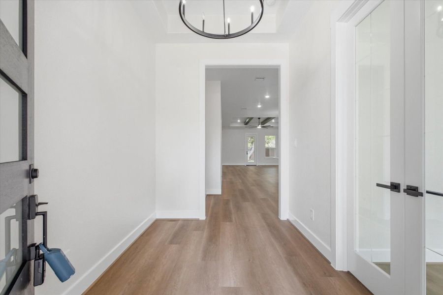 Upon entering, you’ll be greeted by 11 foot ceilings in your foyer, gorgeous wood-look vinyl flooring and an abundance of natural light. Upon entering, you’ll be greeted by 11 foot ceilings in your foyer, gorgeous wood-look vinyl flooring and an abundance of natural light.