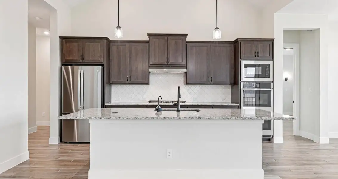 Furnished interior view inside a new home in Village at Three Oaks, Seguin (Image 6). Furnished interior view inside a new home in Village at Three Oaks, Seguin (Image 6).
