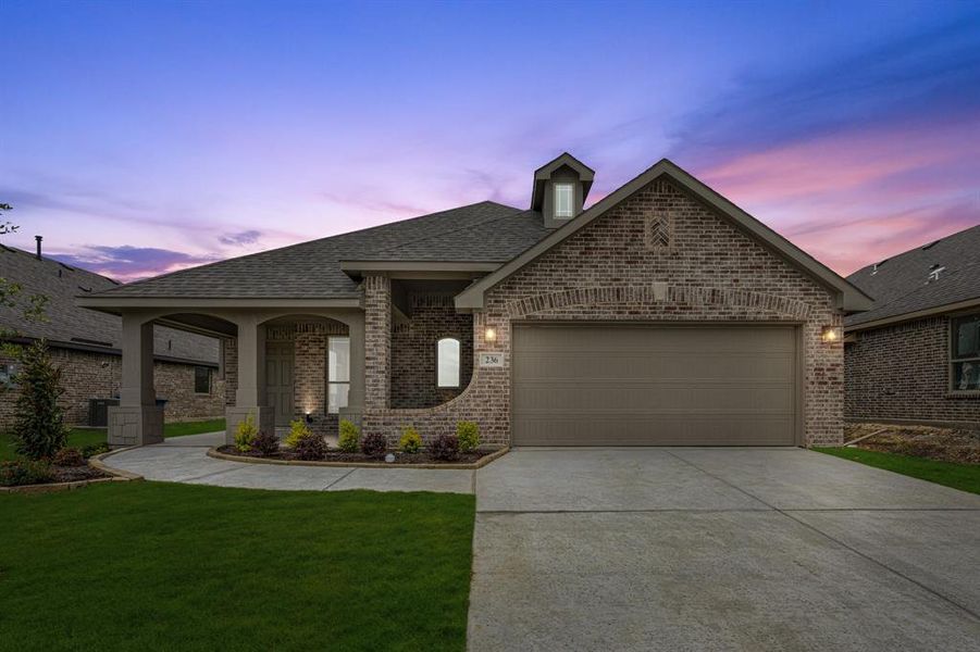 Front exterior of a new home in Sunset Ridge, Alvarado, TX, highlighting curb appeal (Image 2). Front exterior of a new home in Sunset Ridge, Alvarado, TX, highlighting curb appeal (Image 2).