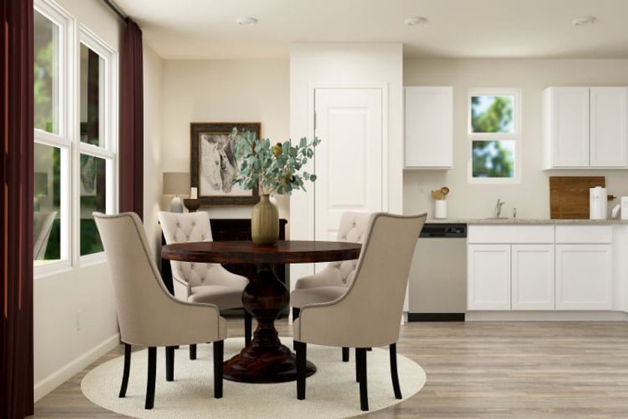 A dining room with a table and chairs.