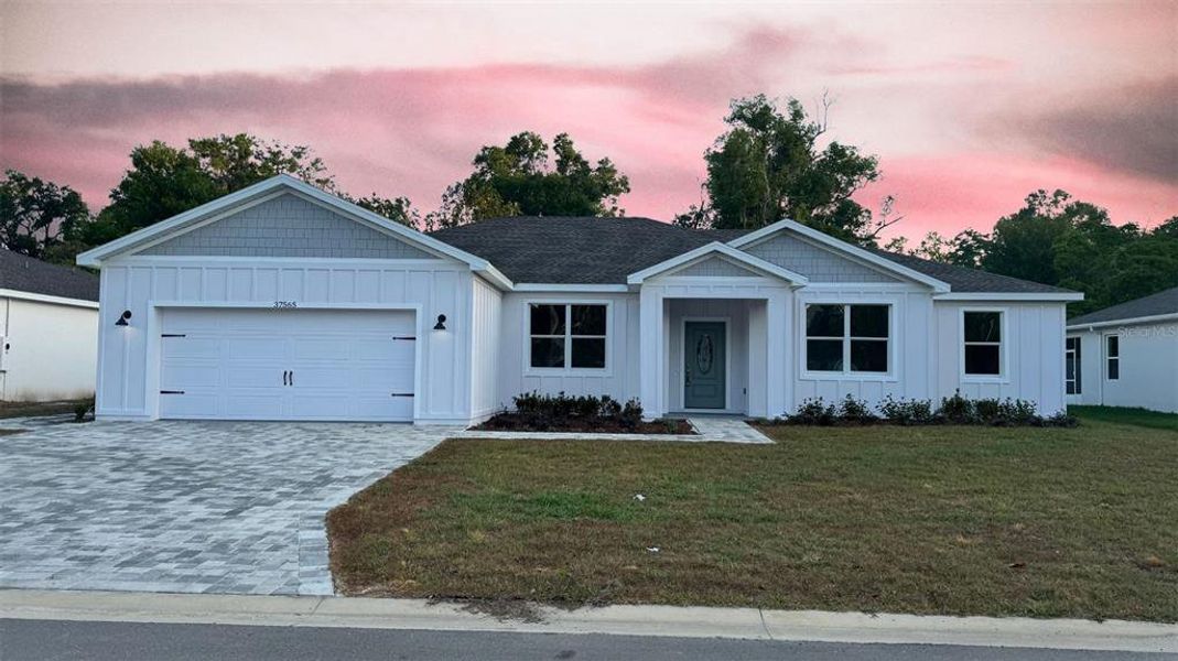 Front exterior of a new home in , Dade City, FL, highlighting curb appeal (Image 22). Front exterior of a new home in , Dade City, FL, highlighting curb appeal (Image 22).