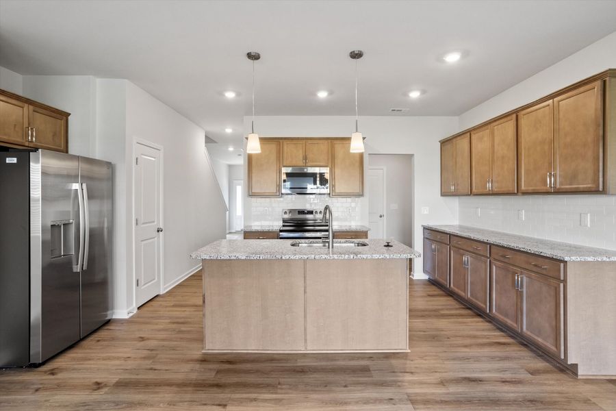 Furnished interior view inside a new home in West Main Townhomes, Sanford (Image 7).