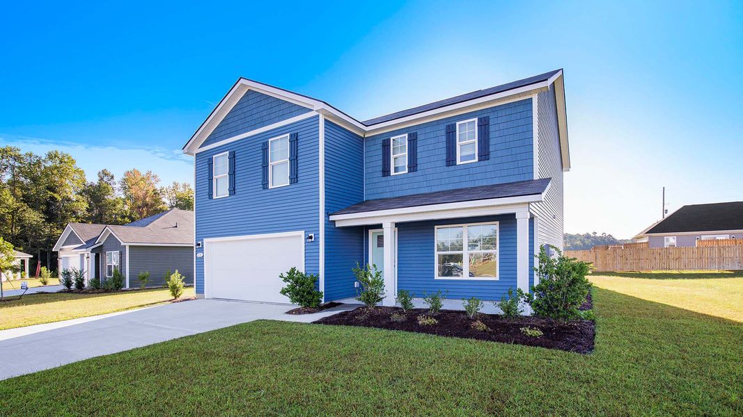 Front exterior of a new home in Ridgefield, Conway, SC, highlighting curb appeal (Image 2). Front exterior of a new home in Ridgefield, Conway, SC, highlighting curb appeal (Image 2).