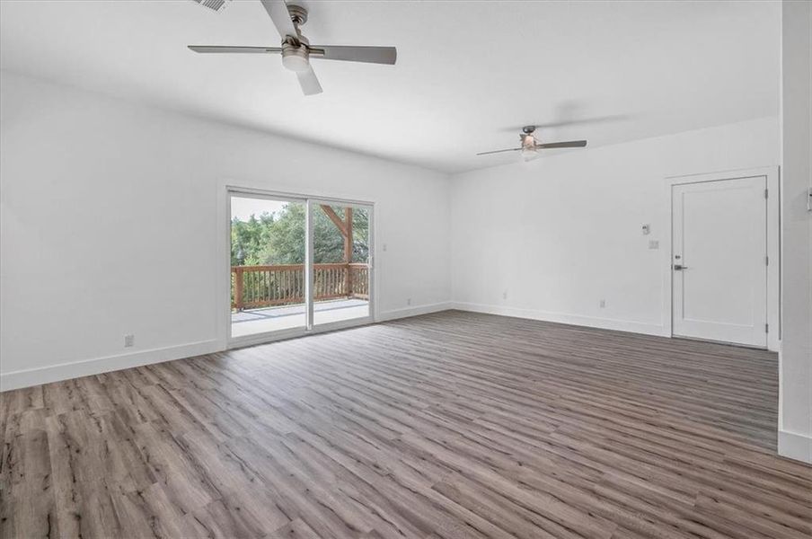 Downstairs Living Room with 2nd Back Patio