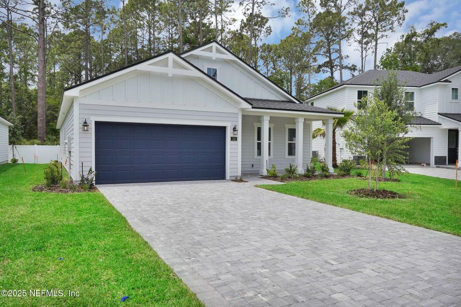 Front exterior of a new home in Landing at Olde Florida, St. Augustine, FL, highlighting curb appeal (Image 19).
