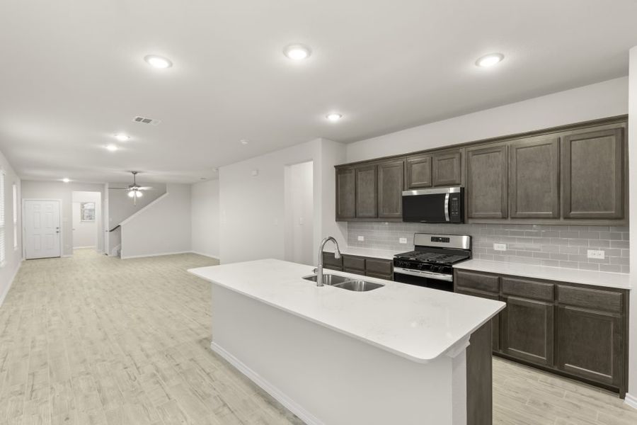 Representative exterior photo of a completed home built from the Willow by Impression Homes in Northspur, Terrell, TX (Image 5). Representative exterior photo of a completed home built from the Willow by Impression Homes in Northspur, Terrell, TX (Image 5).