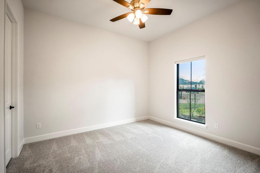 Bedroom #2 with walk-in closet.